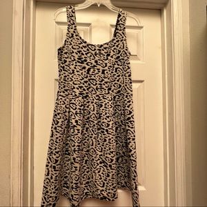 Aqua dress. Size large. Black and cream animal type print. Fit and flare style.